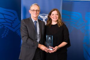 Ms Katherine Henderson accepting her award from Prof Richard James